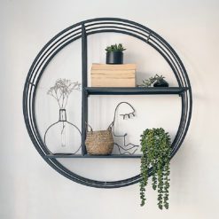 black metal framed circular wall unit comprising three shelving compartments