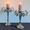 majestic solid metal candleholders with a gleaming nickel plate finish and decorative stags head detailing available in small and large