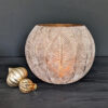 large globe shaped glass candle holder with a frosted champagne gold leaf design