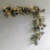 long faux pine and eucalyptus Christmas garland with blue baubles