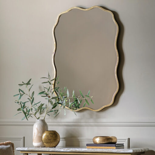 decorative rectangular wall mirror with a wavy silm metal frame finished in gold leaf