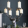 statement silver stag head candleabra with six candle holders nestled within the antlers and crafted from aluminium