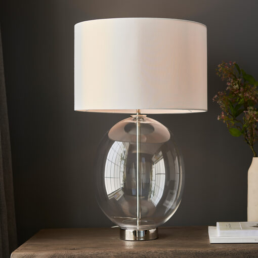 large oval glass table lamp with silver nickel accents and vintage white drum lampshade