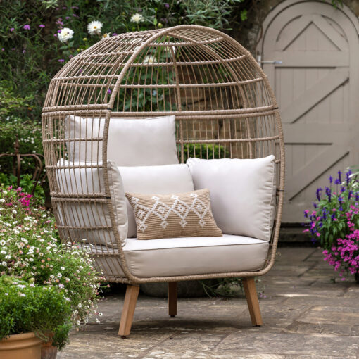 outdoor large cocoon wicker chair with natural cushions